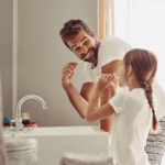 at-home dental care routine, brushing your teeth, gum disease, dentist in searcy