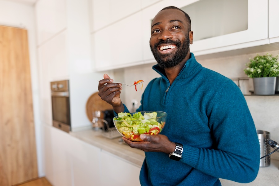 man eating healthy food, nutrition and oral health